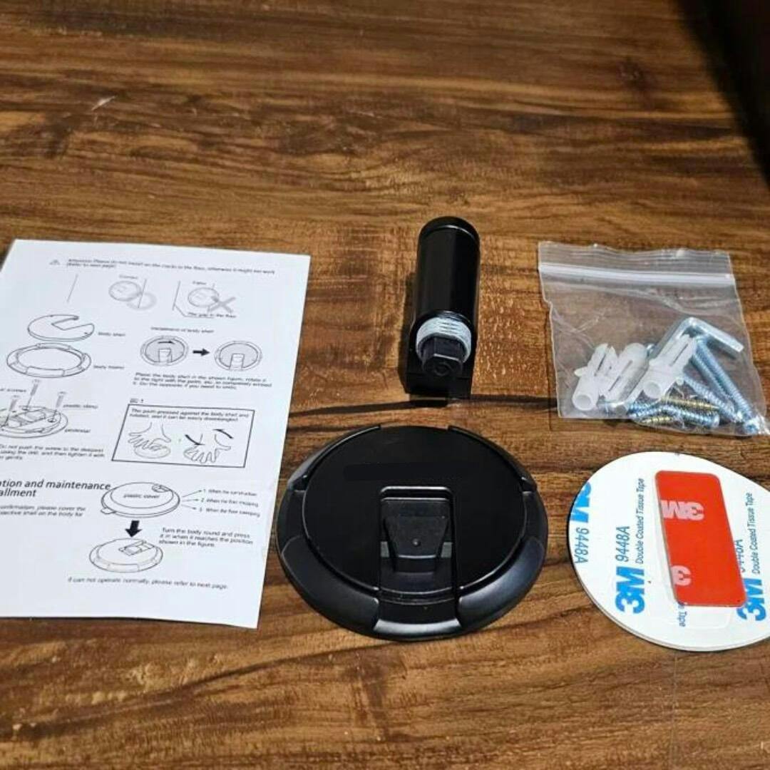 Modern black magnetic door accessory, no drilling required for a secure and convenient home safety solution.