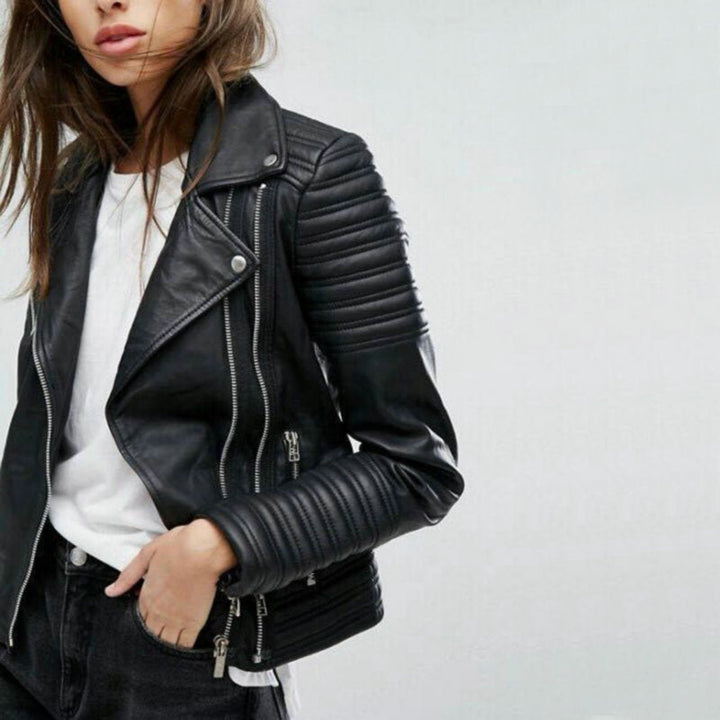 Fitted black biker jacket for women. Elevate your style with this sleek, modern and stylish outerwear piece.