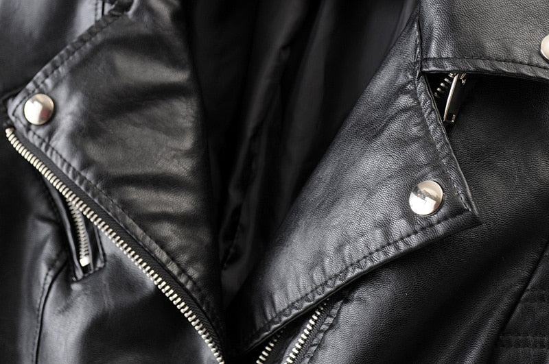 Stylish women's black biker jacket. Features a sleek design, perfect for a versatile, modern and trendy look.