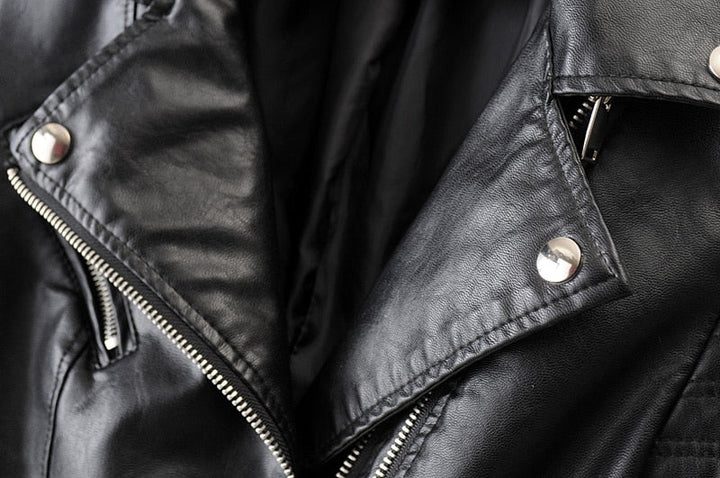 Stylish women's black biker jacket. Features a sleek design, perfect for a versatile, modern and trendy look.