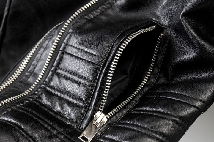 Everyday black women's biker jacket. This fashionable and sleek outerwear offers a contemporary, fitted style.