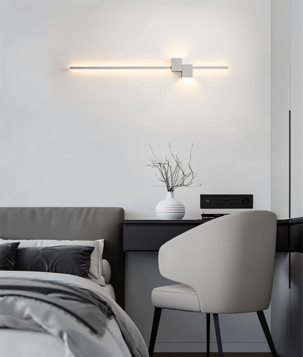 Minimalist LED wall light, provides ambient indirect lighting, versatile sleek fixture for any modern home.