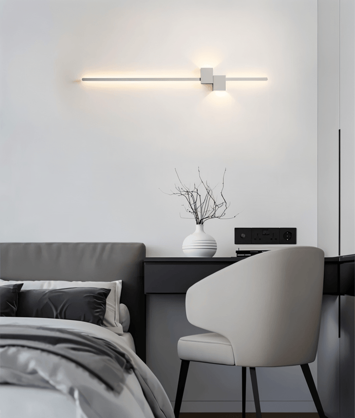 Minimalist LED wall light, provides ambient indirect lighting, versatile sleek fixture for any modern home.
