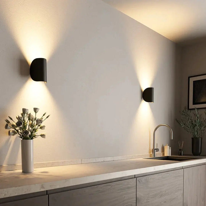 Sleek modern LED wall light for contemporary home lighting. Energy-efficient, minimalist design for any room.