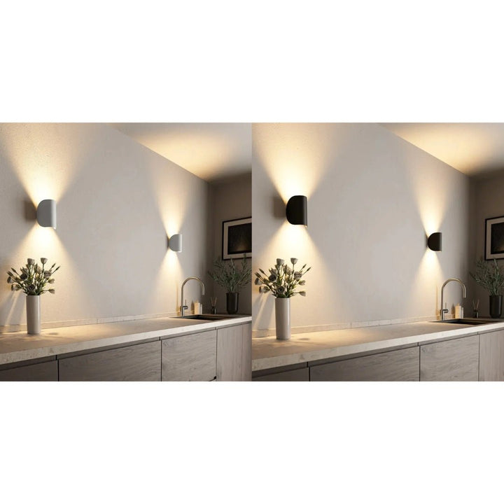 Contemporary LED wall lamp, ideal for modern homes. Offers energy-saving ambient lighting in any interior space.