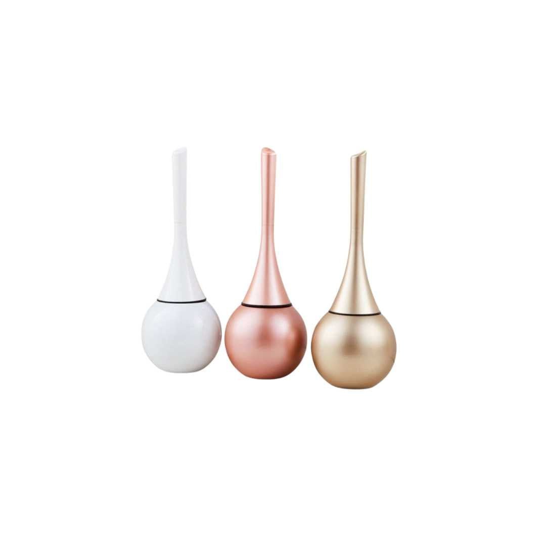Modern toilet brush with a durable silicon head and slim holder, ideal for effective bathroom cleaning.