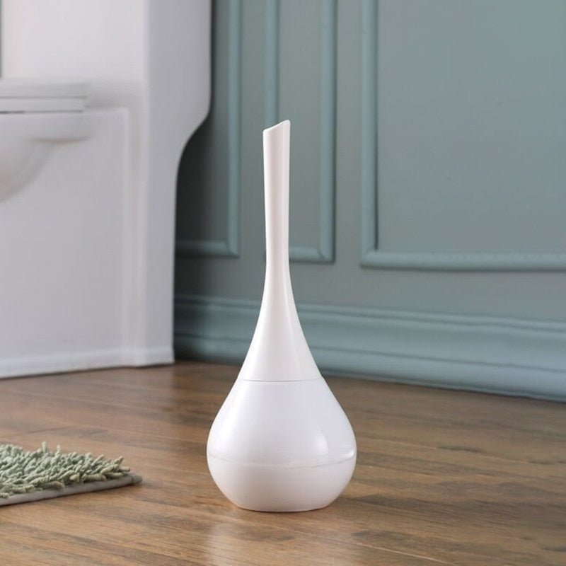 Ergonomic toilet brush with a flexible silicon head, designed for efficient and hygienic bathroom cleaning.