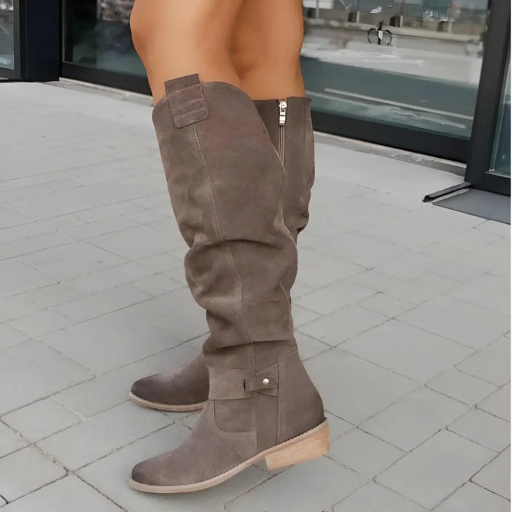 Stylish women's ankle boots with a sleek, structured fit for comfortable fall & winter fashion.