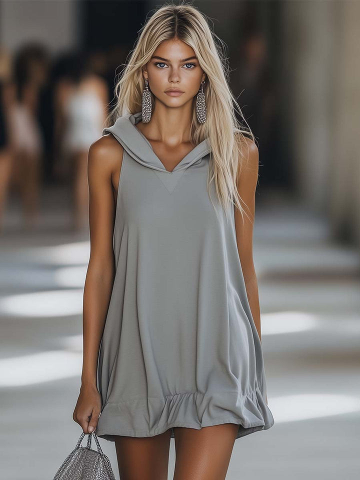 Sleeveless hooded swing mini dress for women, featuring a comfortable relaxed fit and stylish ruffle hem in gray.