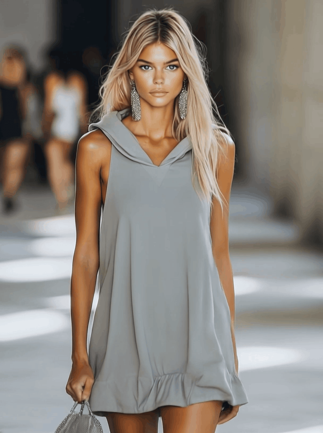 Gray sleeveless mini swing dress with hood & ruffle hem, perfect for casual summer fashion, beachwear, or vacation.