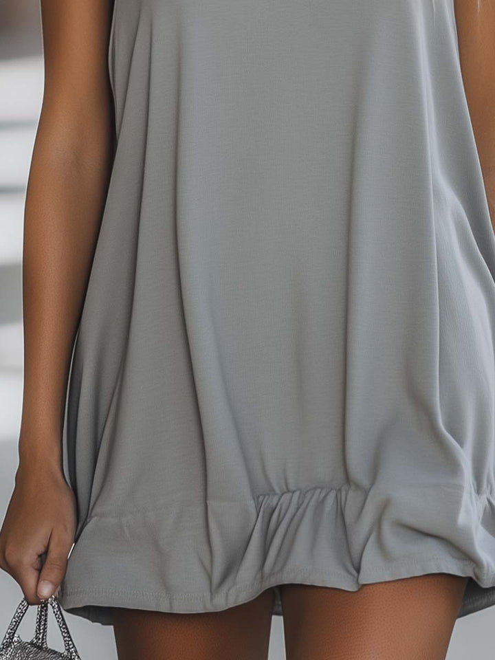 Effortless gray sleeveless hooded swing mini dress for women with a relaxed fit & stylish ruffle hem, summer casual.