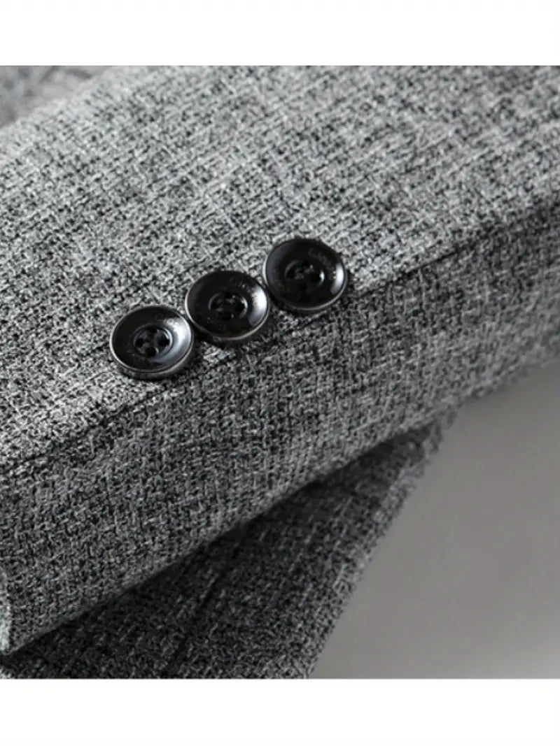 Back view of a sleek slim fit men's blazer, showcasing its modern tailoring and comfortable design.