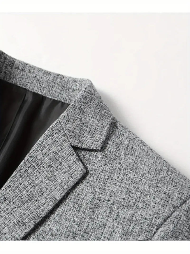 Effortless men's fashion with a lightweight slim fit spring blazer, offering a contemporary tailored look.