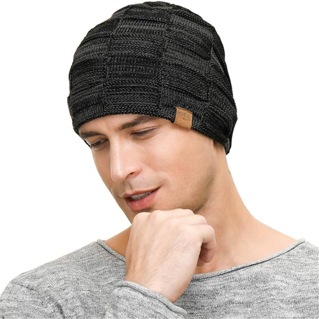 Stay warm with this stylish slouchy knitted beanie, a comfortable unisex winter hat in various shades.