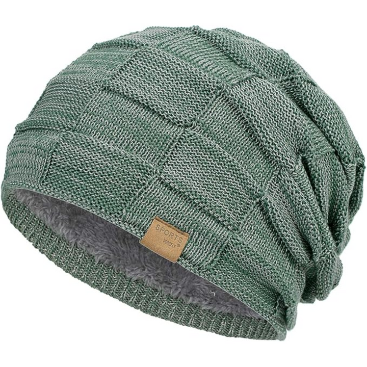 Comfortable knitted beanie with a slouchy fit, ideal unisex winter hat for cold weather outings.