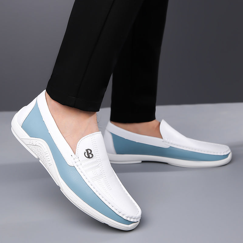 Classic men's two-tone loafers, combining elegant design with comfortable slip-on wear.