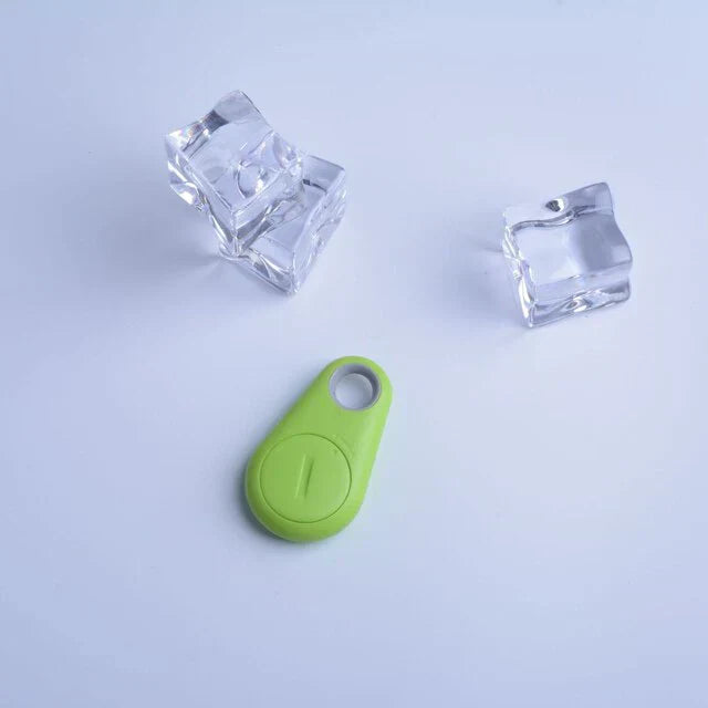 Pet GPS tracker next to a pet bowl, illustrating its integration into daily pet care routines for dog and cat safety.