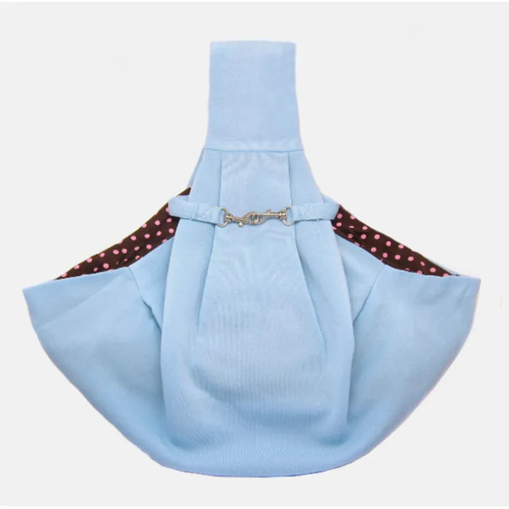 Portable pet sling carrier in a car seat, perfect for small dogs on the go