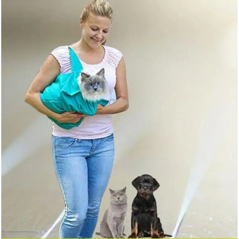 Stylish pet sling carrier for small dogs, essential for car journeys and pet travel