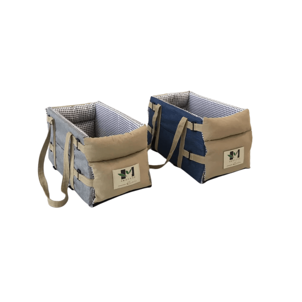 Portable small dog car seat for canine travel, featuring soft interior and safety tether.