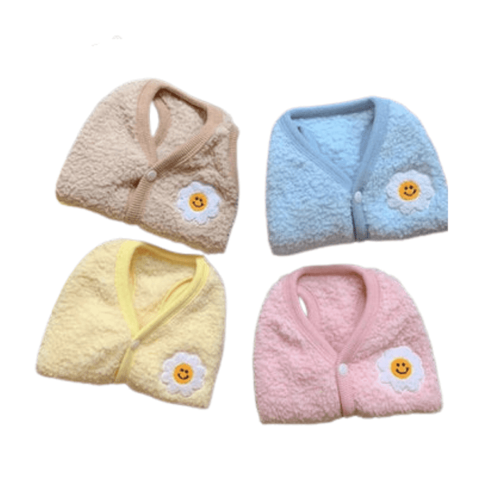 Medium dog wearing yellow sunflower pet vest, adorable macaron dog sweater