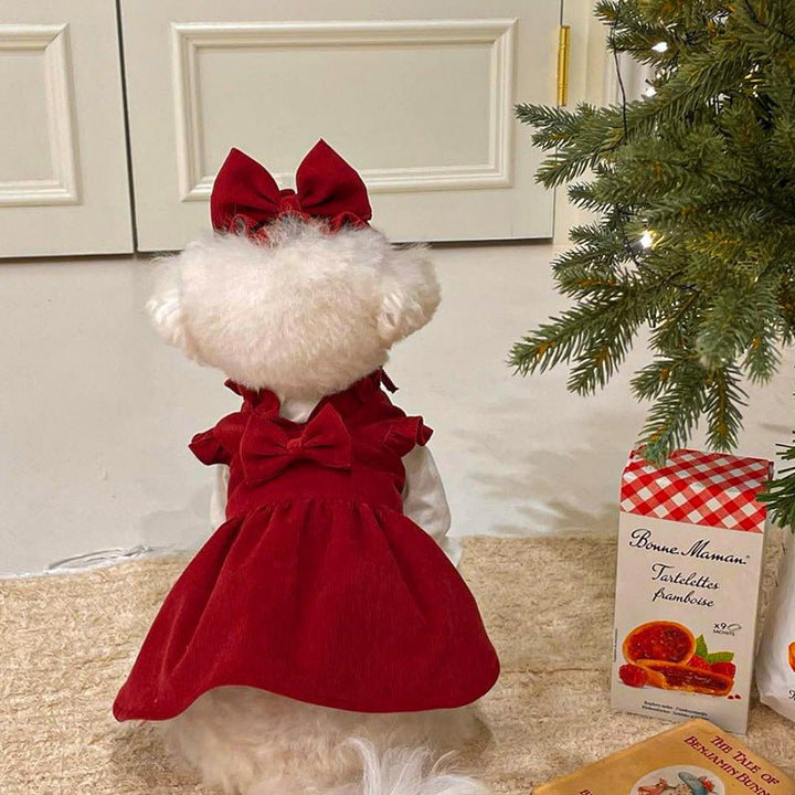 Close-up of a dog princess dress, showcasing delicate bow accents and intricate fabric details.