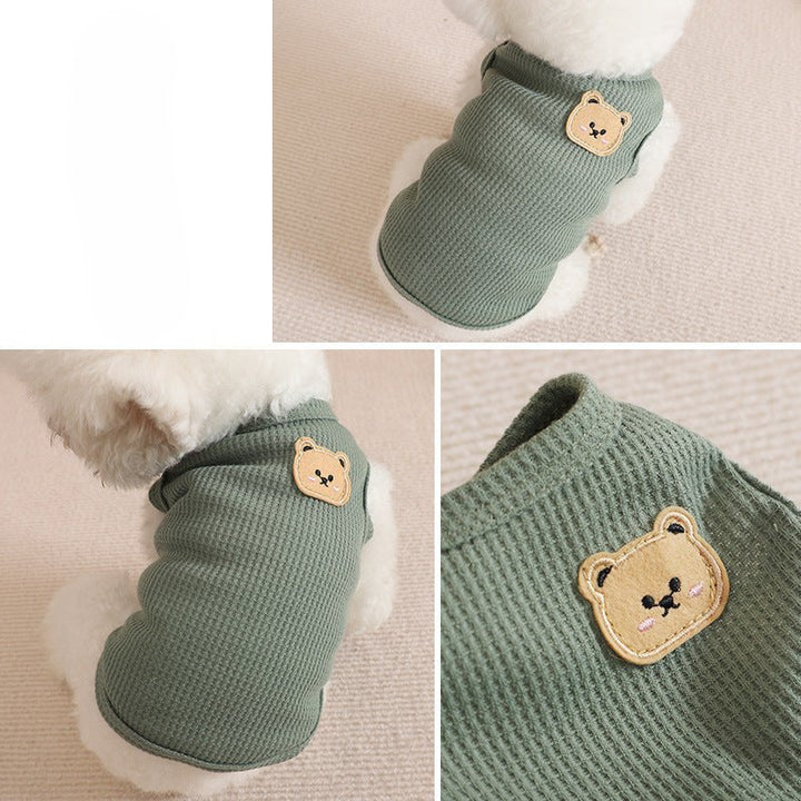 Product shot of a folded waffle dog vest in a neutral color, ready for small and medium dogs.