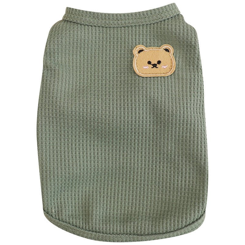 Adorable dog modeling a perfectly fitted waffle knit pet sweater, emphasizing comfort and style.