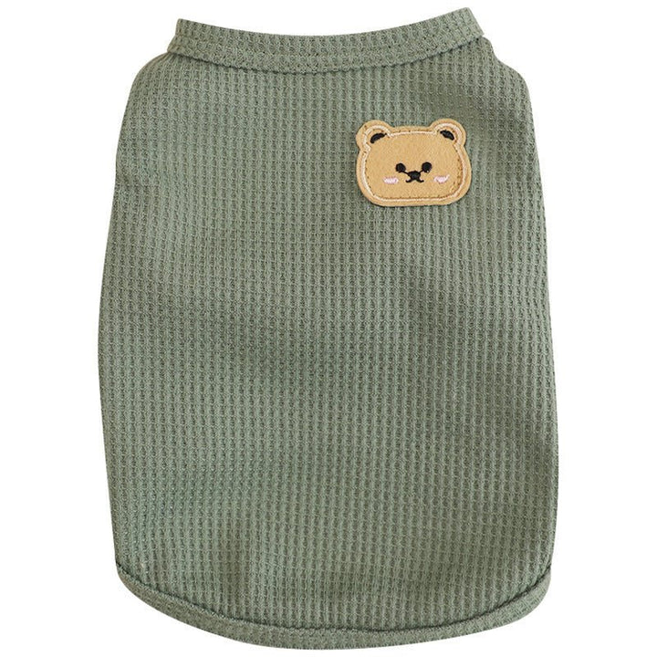 Adorable dog modeling a perfectly fitted waffle knit pet sweater, emphasizing comfort and style.