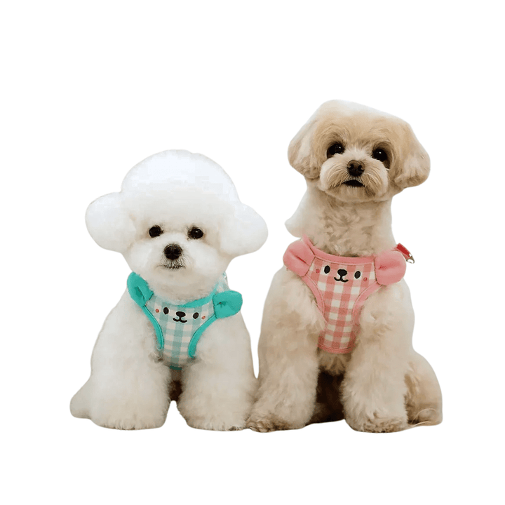 Medium dog in red adjustable tank top harness, front view, stylish and secure pet apparel.