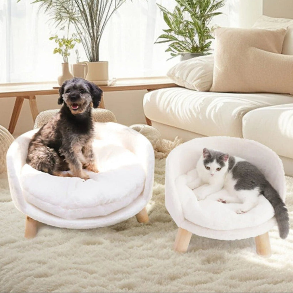Luxurious gray plush pet bed elevated on sturdy wooden legs, designed for small pets' comfort.