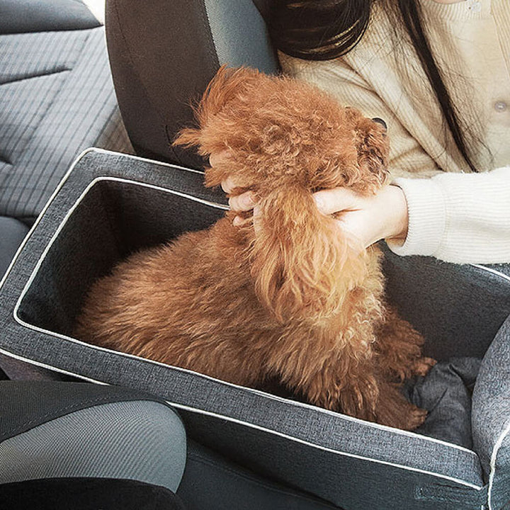 Close-up of the soft grey suede material of the pet lookout car seat for small dogs.