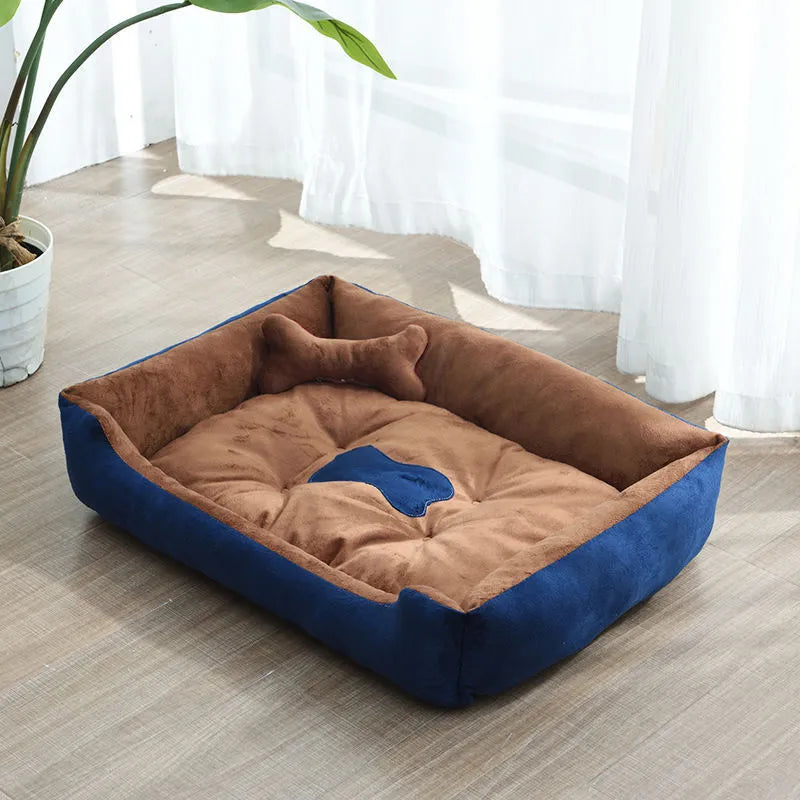 Overhead view of a plush small pet calming bed with a fluffy raised rim for ultimate pet comfort.