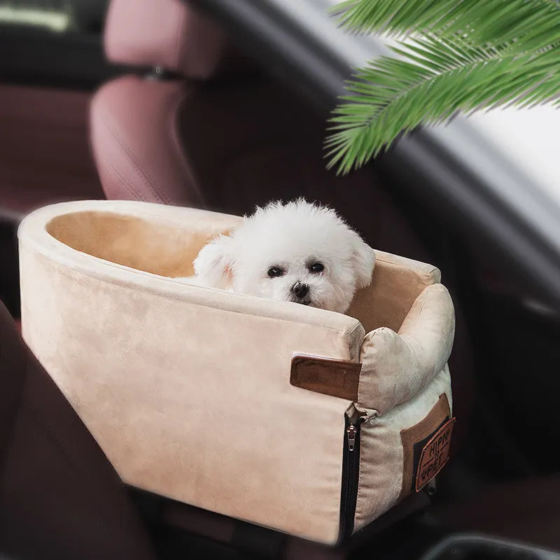 Small pet car seat carrier with secure attachment for safe dog or cat travel in a car