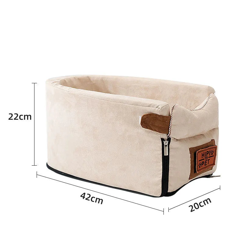 Small pet car seat with secure attachment, ideal for road trips with dogs or cats
