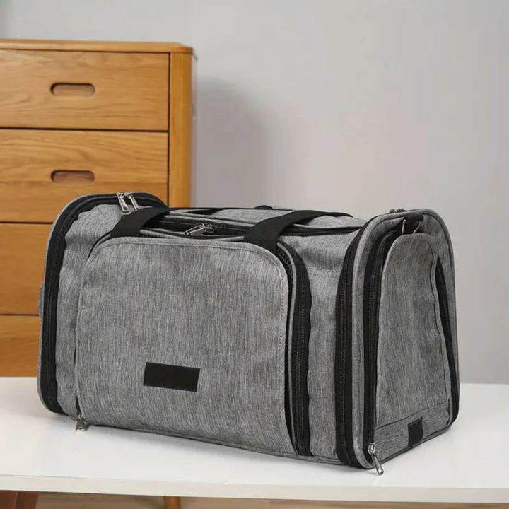 Airline cabin approved pet travel bag in gray, designed for comfort and safety of small cats and dogs.