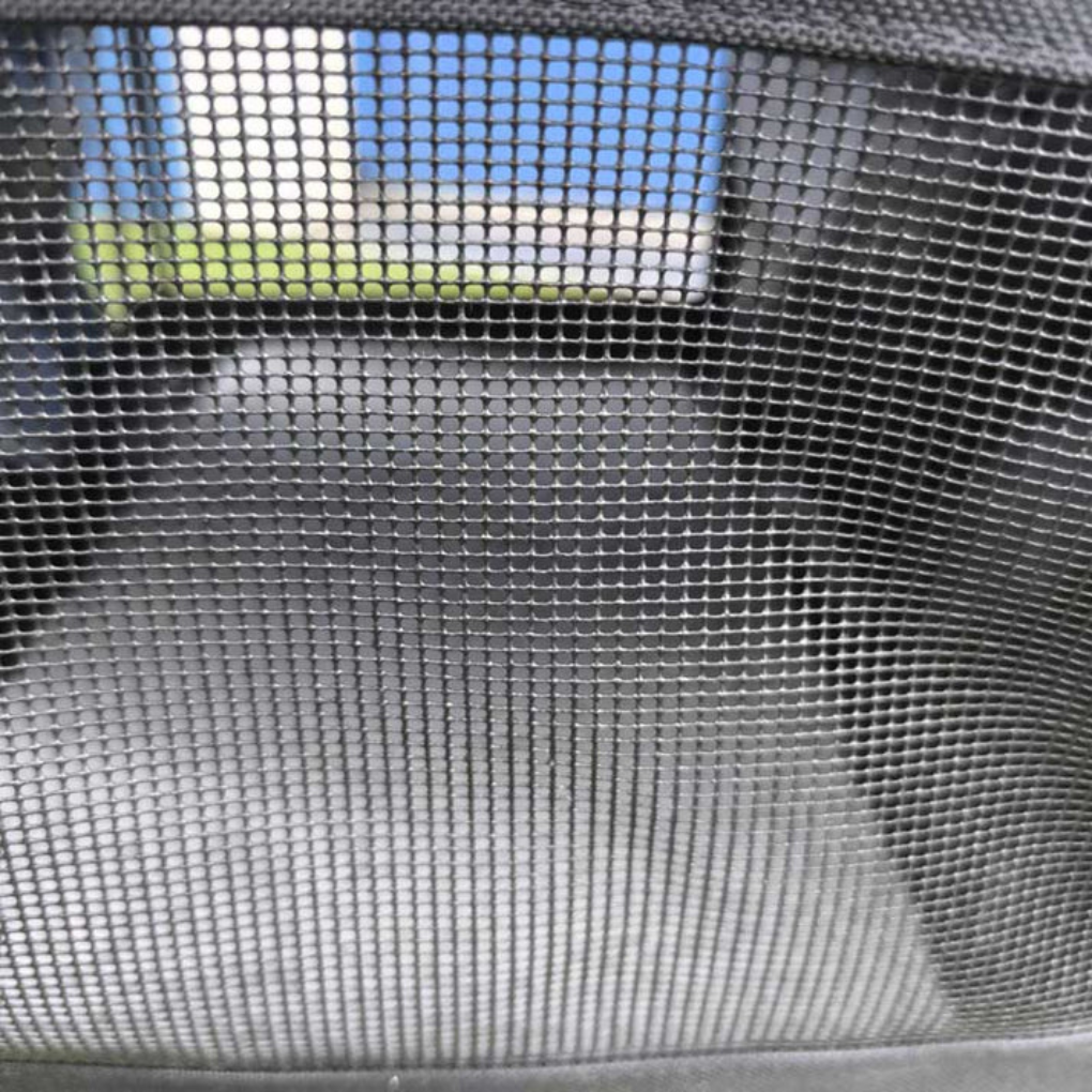 New4 cat or dog carrier, ideal for airline travel, with comfortable interior and well-ventilated sides.