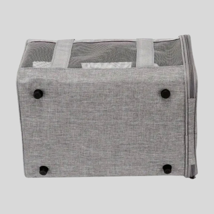 Airline cabin approved pet carrier bag for small dogs and cats, featuring breathable mesh panels & sturdy construction