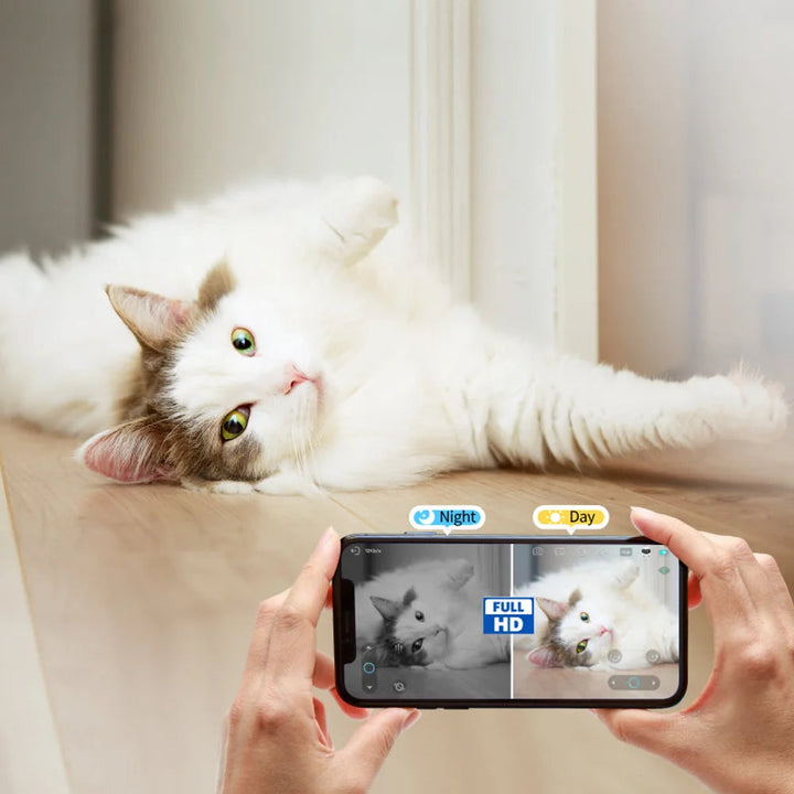 White smart pet camera with HD video and two-way talk, ideal for dog and cat owners.