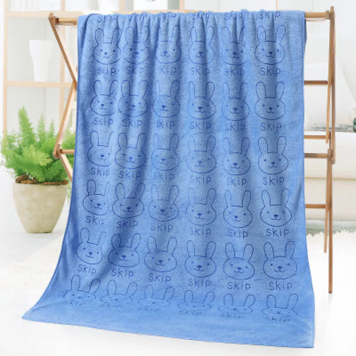 Comforting toddler blanket with animal motifs, soft and cozy for playtime or napping.