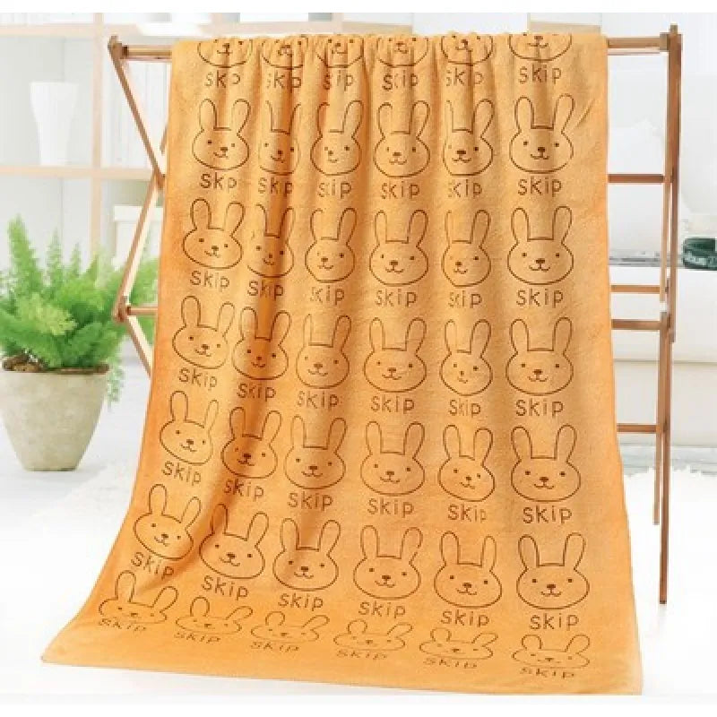 Ultra-soft children's blanket featuring playful animal designs, great for gifting.