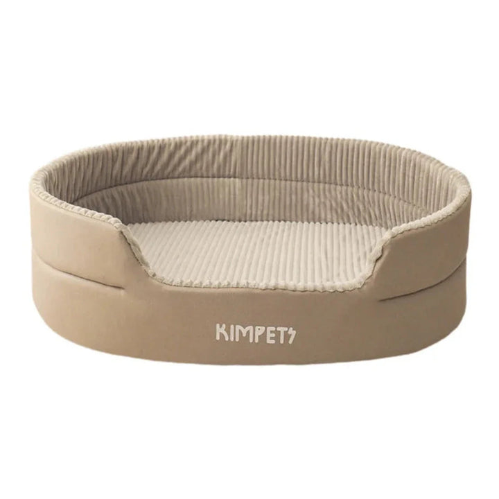 Soft bolster pet bed with washable, water-resistant base, ideal for dog or cat comfort.