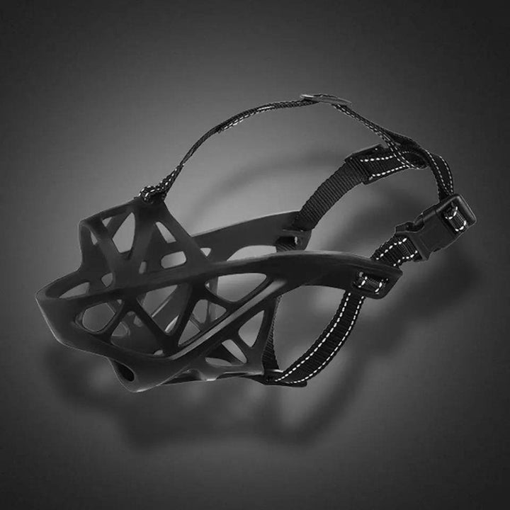 Close-up of a soft, breathable dog muzzle, showcasing comfortable mesh for pet safety & training.