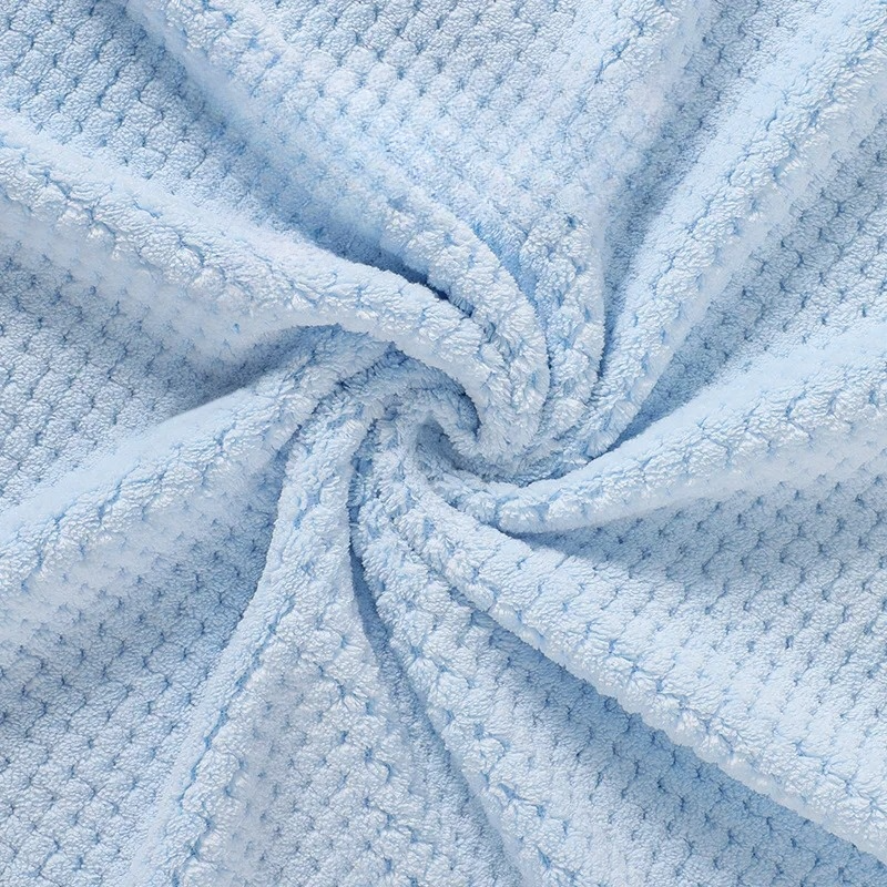 Travel-friendly coral fleece pet blanket, lightweight and soft for on-the-go comfort.