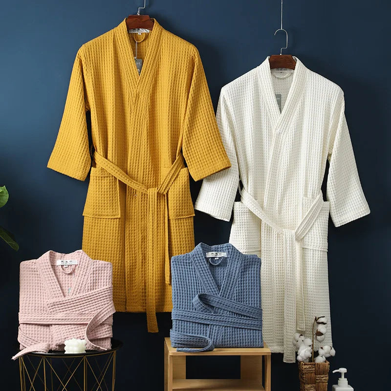 A man relaxing in a soft cotton bathrobe, enjoying ultimate comfort and leisure at home.
