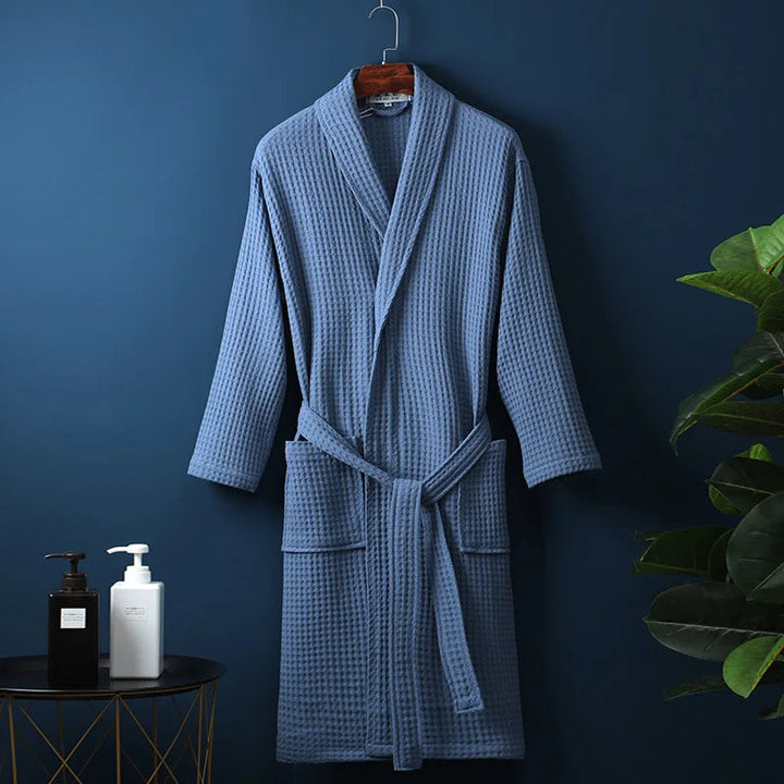 Indulgent men's cotton bath robe, ensuring relaxation and ultimate comfort after a long day.