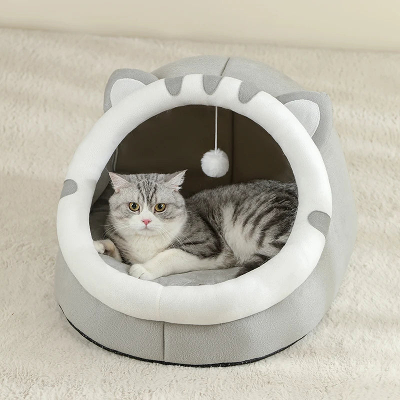 Machine washable pet cave bed with a plush cotton interior, perfect for small pets to nestle in.