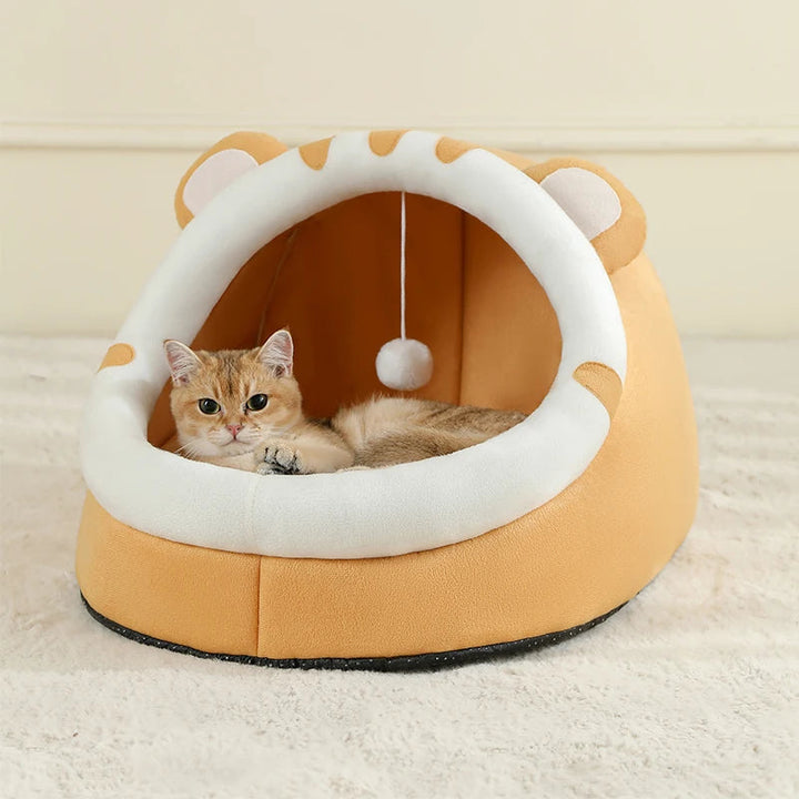 Neutral toned pet cave bed, a comfy cotton nest for cats or small dogs, promoting deep sleep.