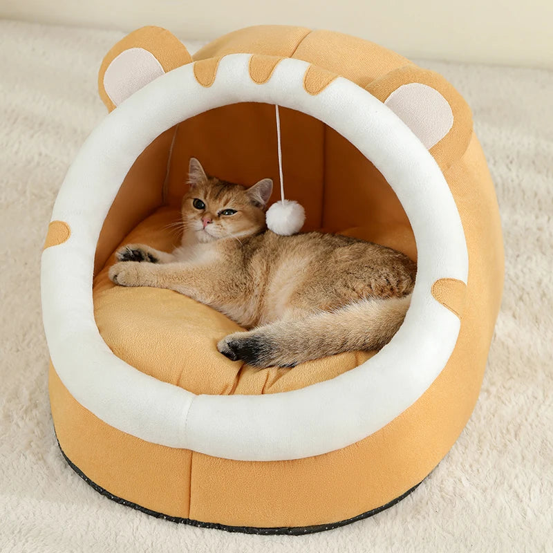 Durable and machine washable pet cave, offering a warm cotton nest for small pets like cats and dogs.
