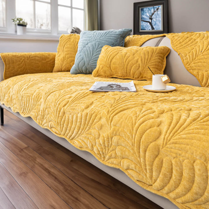Stylish non-slip cotton sofa protector, featuring an appealing leaf design. Keeps your couch looking new.